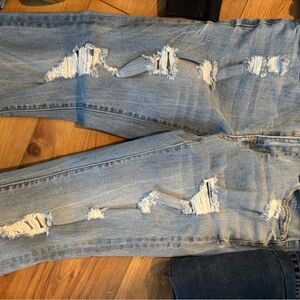 Aero blue jeans with rips size 8, never worn, no tags.